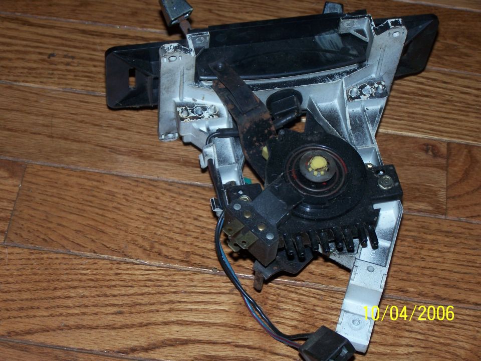 Automatic transmission shifter assembly with wiring and linkage. Date stamp visible on the bottom right