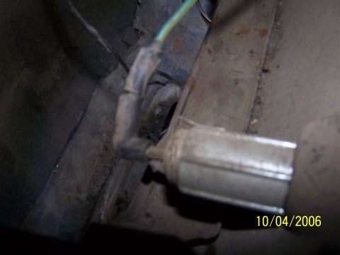 1979 Ford F-150 - An electrical component with wiring is visible, likely part of a vehicle's system.