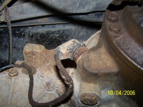 1979 Ford F-150 - A close-up view of a corroded mechanical part, possibly from a vehicle's drivetrain.