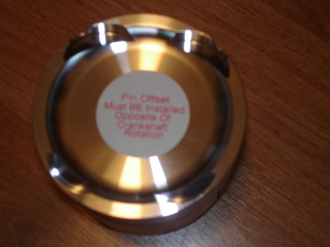 1994 Ford Probe - Piston with installation instructions sticker, likely for an engine rebuild.