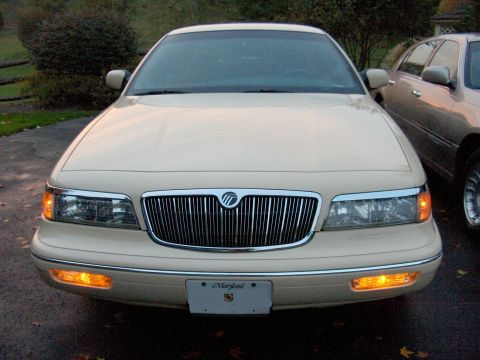 1996 Mercury Grand Marquis - A 1996 Mercury Grand Marquis is shown from the front, parked next to another vehicle.