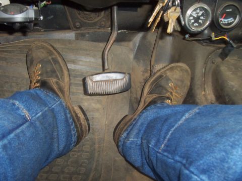 1994 Ford F-150 - View from driver's seat showing feet on pedals and keys in ignition.