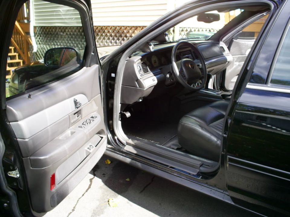 Interior of a 2003 Mercury Marauder showing dashboard and seats