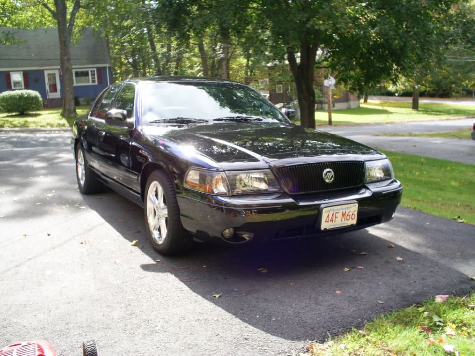 Black 2003 Mercury Marauder parked in driveway