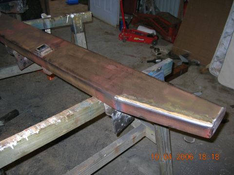 1991 Ford F-150 - Custom steel bumper fabrication in progress, resting on sawhorses in a workshop.