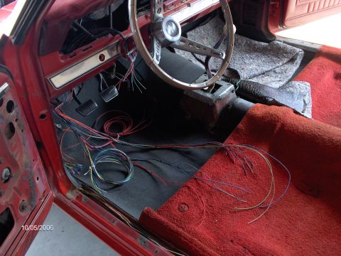 1966 Ford Fairlane - The new wiring harness going in. By the time this picture was taken Bob had already wired in the rear of the car at the trunk. You can see…