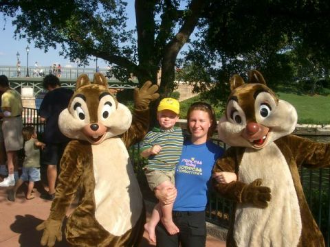 1995 Ford Bronco - A family poses for a photo with Chip and Dale characters at a theme park.