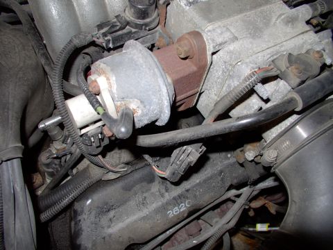 1990 Lincoln Town Car - Gently disconnect the vacuum lines and electrical connectors, noting where they go