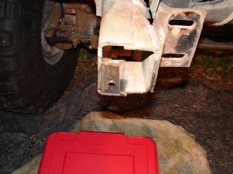 1996 Ford Bronco - This photo shows a close-up of a vehicle's frame and a tow hook bracket, not the entire vehicle.