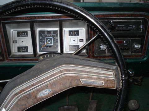 1979 Ford Bronco - Interior view of a 1979 Ford Bronco dashboard, showing gauges and steering wheel.