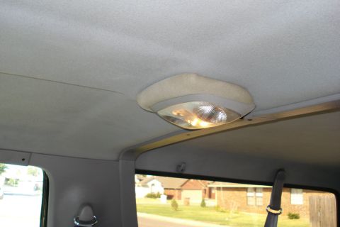 1994 Ford Bronco - Vehicle interior light fixture is visible against the headliner.