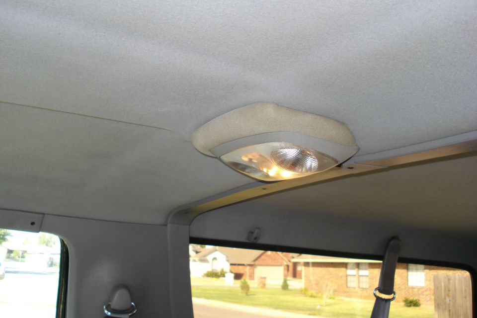Interior overhead light fixture in a vehicle