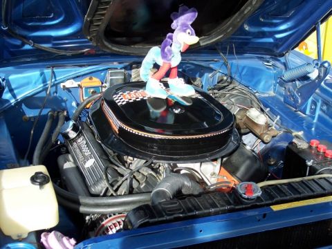 1972 Ford Ranchero - Engine bay view a Mopar 440 air cleaner and a roadrunner toy.