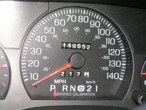 1999 Ford Crown Victoria - The odometer reads 149,552 miles, with the speedometer indicating 217 km/h.