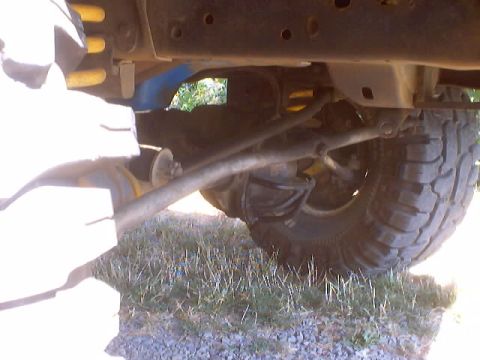 1976 Ford F-100 - A rock tore off my steering dampener and pushed my linkage up about 6" Going to FULL HIGH STEER.