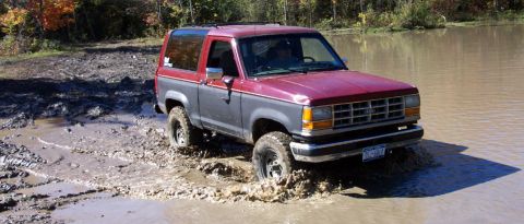 1979 Ford Bronco - This 1978 Ford Bronco is shown from a three-quarter front angle on a dirt lot.
