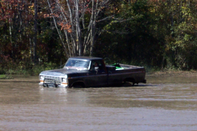 Pickup truck driving on a road