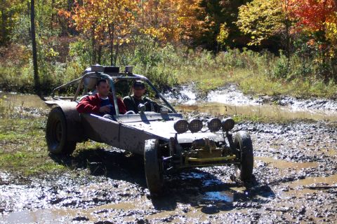 1979 Ford Bronco - This off-road buggy navigates a muddy trail during the fall season.