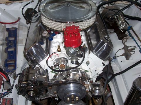 1978 Ford Mustang II - Engine bay with V8 motor components, including chrome valve covers and air cleaner.