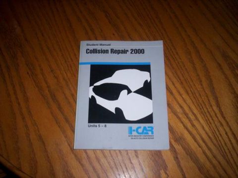 1989 Ford Bronco - A student manual for collision repair is shown on a wooden surface.