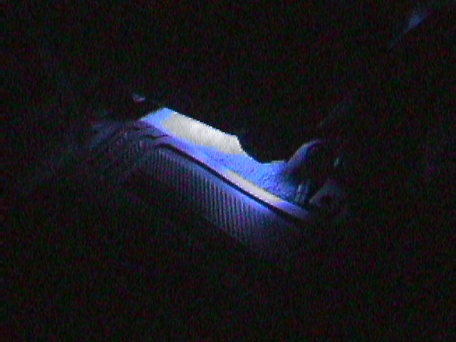 Dashboard with blue ambient lighting and textured surface