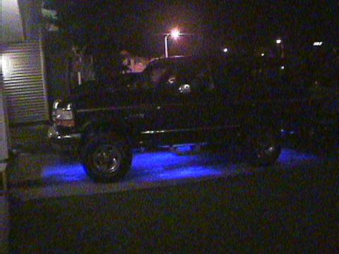 1994 Ford Bronco - This 1994 Ford Bronco is parked at night, illuminated by blue underglow lights.