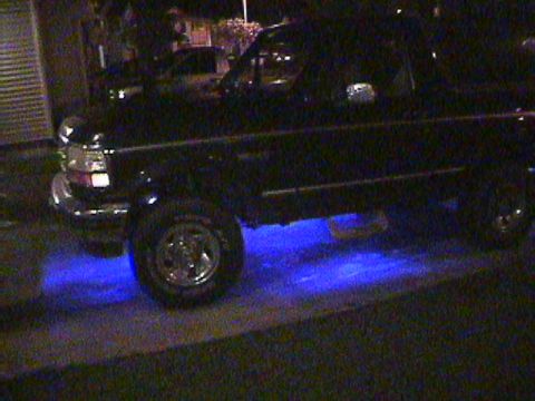 1994 Ford Bronco - This 1994 Ford Bronco has custom blue underglow lighting visible from the side.