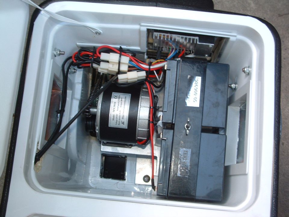 Motor and electronics inside a white box