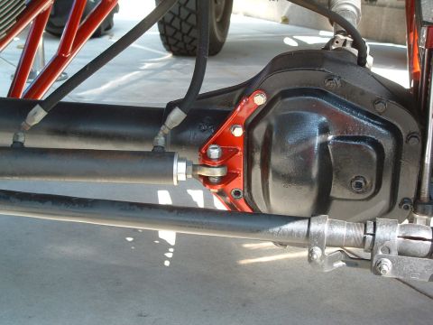 2004 Toyota Tacoma - Rear axle assembly with hydraulic steering components visible.