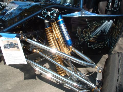 2004 Toyota Tacoma - Custom buggy suspension components, including Koni shocks and gold springs, with a "FOR SALE" sign.