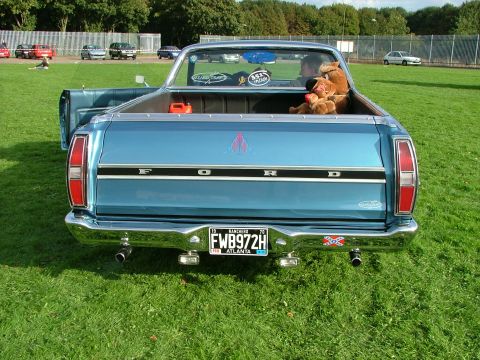 1970 Ford Ranchero - Rear view of a blue 1970 Ford Ranchero pickup truck parked on grass.