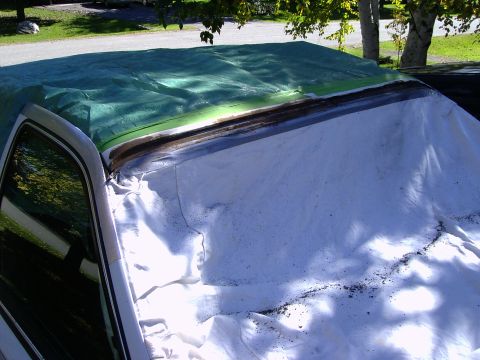 1990 Lincoln Town Car - Windshield out, everything taped off and ready to get at the rust over the windshield.