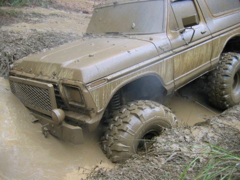 1992 Ford Mustang - This 1978 Ford Bronco is stuck in the mud, showing its off-road capabilities.