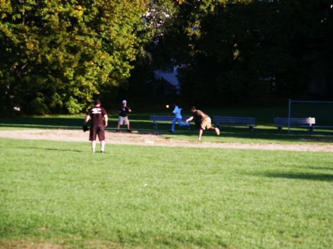 2001 Mercury Grand Marquis - A baseball game is in progress on a sunny day with spectators watching.