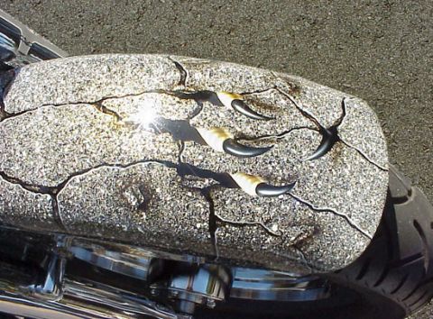 1999 Harley-Davidson Fat Boy - Custom painted motorcycle fender features a cracked stone design with claw marks.
