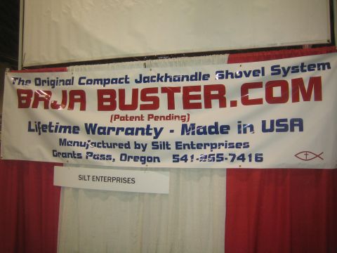 1990 Ford Bronco - Vendor banner advertising the Baja Buster.com compact jackhandle shovel system made by Silt Enterprises in Grants Pass, Oregon.