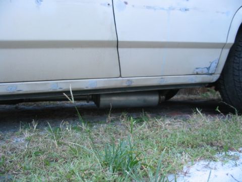 1985 Ford Crown Victoria LTD - Exhaust system visible on the underside of a 1985 Ford Crown Victoria LTD.