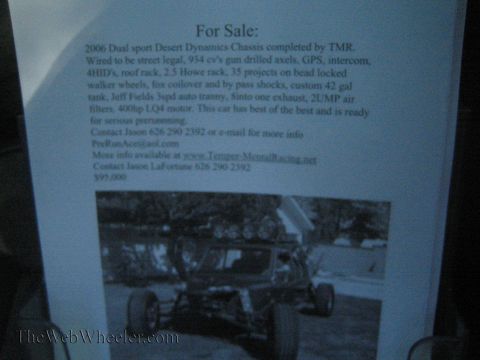1990 Ford Bronco - Photo of a printed 'For Sale' flyer describing a 2006 dual-sport desert prerunner chassis with specs and a vehicle photo.