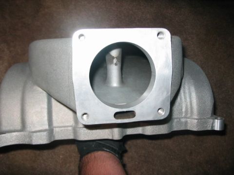 1991 Ford Bronco - Close-up view of an aftermarket intake manifold, likely for a performance application.