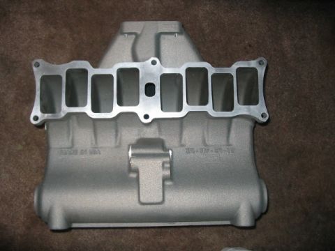 1991 Ford Bronco - Close-up of an aluminum intake manifold, showing part number 775-32F-BR-40 and 'MADE IN USA' markings.