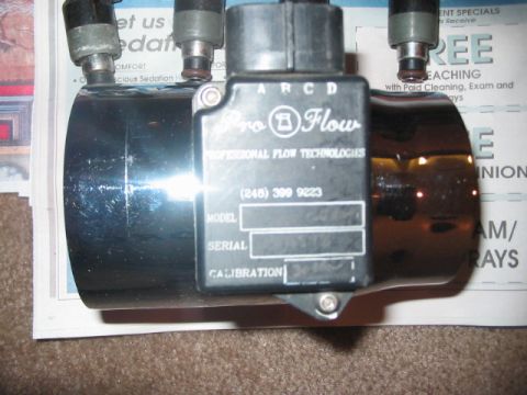 1991 Ford Bronco - A Pro-Flow mass air flow sensor is shown, with visible text including model and serial number fields.