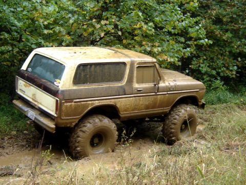 1992 Ford Mustang - This 1978 Ford Bronco is stuck deep in the mud off-road.