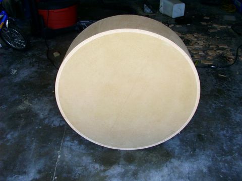 2000 Ford Excursion - Unfinished round speaker box constructed from particle board.