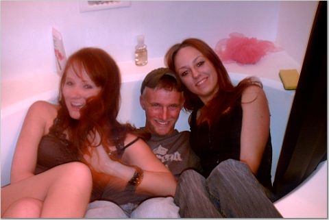 1984 Ford Bronco - A group of friends share a moment in a bathtub.
