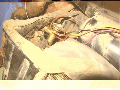 1988 Ford C-350 (Centurion Conversions) - AC expansion valve with associated copper tubing and electrical wiring.