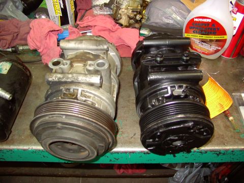 1988 Ford C-350 (Centurion Conversions) - Comparison of an old AC compressor with a freshly painted replacement unit.