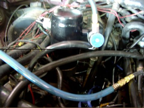 1988 Ford C-350 (Centurion Conversions) - Close-up of engine bay components, likely related to the air conditioning system.