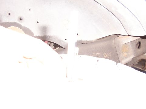1988 Ford C-350 (Centurion Conversions) - Undercarriage view showing frame and suspension parts. Year and model are not identifiable.