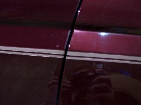 1988 Ford C-350 (Centurion Conversions) - The reflection in the paint shows a person holding a camera, taking the photo.