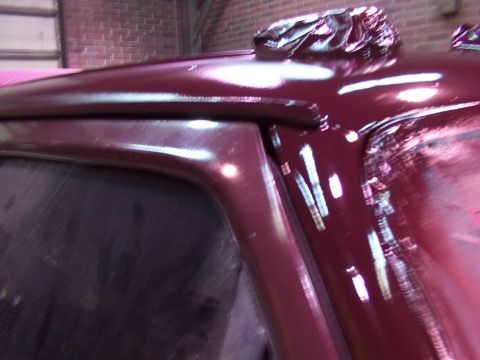 1988 Ford C-350 (Centurion Conversions) - Vehicle roof and door frame detail with fresh paint and masking tape visible.